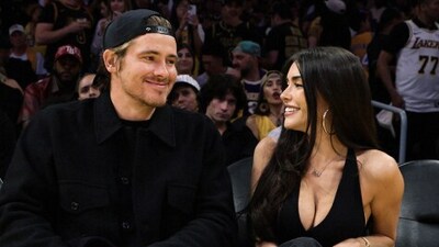 Justin Herbert reacted quickly to save Madison Beer from a flying basketball at Lakers game. (Instagram/@lakers) Justin Herbert reacted quickly to save Madison Beer from a flying basketball at Lakers game. (Instagram/@lakers)
