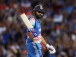 Rohit Sharma celebrates his century during the ODI match against Australia at Sydney Cricket Ground.