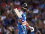 India's Rohit Sharma celebrates after reaching his century
