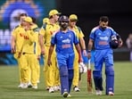 Rohit Sharma and Virat Kohli lead the teams off the field after a match-winning partnership. Rohit Sharma and Virat Kohli lead the teams off the field after a match-winning partnership.