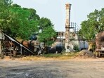 Two pothole-filling machines, procured at a cost of  <span class='webrupee'>₹</span>4 crore, have been lying unused for several months as they rely entirely on the asphalt supply from the Hambaran Road plant. (Manish/HT)