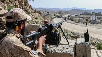 A Taliban security personnel stands guard along a road near the Ghulam Khan zero-point border crossing between Afghanistan and Pakistan in Gurbuz district in the southeast of Khost province on October 20, 2025. (AFP) A Taliban security personnel stands guard along a road near the Ghulam Khan zero-point border crossing between Afghanistan and Pakistan in Gurbuz district in the southeast of Khost province on October 20, 2025. (AFP)