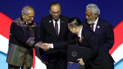 China’s Premier Li Qiang shakes hands with Timor-Leste’s President Jose Ramos-Horta during the signing ceremony of the declaration on the admission of the Democratic Republic Of Timor-Leste into ASEA. (Reuters)