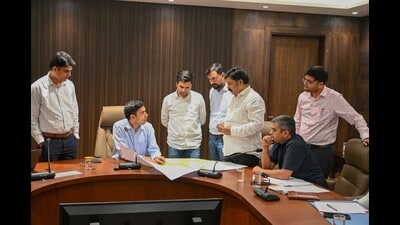 Commissioner Pradeep Dahiya, in the meeting, said buildings releasing sewage into drains may be demolished as MCG enforces stricter pollution controls. (Parveen Kumar/HT) Commissioner Pradeep Dahiya, in the meeting, said buildings releasing sewage into drains may be demolished as MCG enforces stricter pollution controls. (Parveen Kumar/HT)