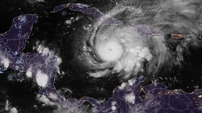 Hurricane Melissa is rapidly intensifying, transitioning from a tropical storm to a Category 4 hurricane in just 12 hours, with up to 40 inches of rain expected in Jamaica and Hispaniola through Wednesday.(Photo by RAMMB/CIRA / AFP) / RESTRICTED TO EDITORIAL USE - MANDATORY CREDIT "AFP PHOTO / RAMMB/CIRA " - HANDOUT - NO MARKETING NO ADVERTISING CAMPAIGNS - DISTRIBUTED AS A SERVICE TO CLIENTS (AFP) Hurricane Melissa is rapidly intensifying, transitioning from a tropical storm to a Category 4 hurricane in just 12 hours, with up to 40 inches of rain expected in Jamaica and Hispaniola through Wednesday.(Photo by RAMMB/CIRA / AFP) / RESTRICTED TO EDITORIAL USE - MANDATORY CREDIT "AFP PHOTO / RAMMB/CIRA " - HANDOUT - NO MARKETING NO ADVERTISING CAMPAIGNS - DISTRIBUTED AS A SERVICE TO CLIENTS (AFP)
