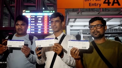 Passengers display their boarding passes at Netaji Subhas Chandra Bose International Airport before boarding the first direct flight to Guangzhou, China, after a five-year hiatus, as IndiGo resumes the route, in Kolkata, West Bengal. (PTI) Passengers display their boarding passes at Netaji Subhas Chandra Bose International Airport before boarding the first direct flight to Guangzhou, China, after a five-year hiatus, as IndiGo resumes the route, in Kolkata, West Bengal. (PTI)