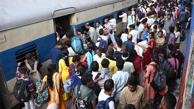 Passengers board an overcrowded train ahead of the Chhath Puja festival at Patna Railway Station in Patna, Bihar, (Santosh Kumar/ Hindustan Times)