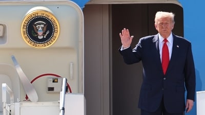 US President Donald Trump waves as he disembarks from Air Force One upon his arrival at Kuala Lumpur International Airport to attend the 47th ASEAN summit (AP) US President Donald Trump waves as he disembarks from Air Force One upon his arrival at Kuala Lumpur International Airport to attend the 47th ASEAN summit (AP)