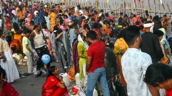 Devotees gather to take bath in River Ganga on the occasion of the second day of Chhath Puja festival at Patipul Digha Ghat, in Patna on Sunday.&nbsp;(Ashok Sinha/ANI)