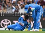 Shreyas Iyer reacts in pain after falling on the ground while taking a catch during the third one-day international. Shreyas Iyer reacts in pain after falling on the ground while taking a catch during the third one-day international.