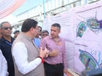 Chief Minister Pushkar Singh Dhami reviews the proposed Land Port construction site at Banbasa in Champawat district, alongside officials of the Land Ports Authority of India. Chief Minister Pushkar Singh Dhami reviews the proposed Land Port construction site at Banbasa in Champawat district, alongside officials of the Land Ports Authority of India.