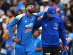 Shreyas Iyer reacts in pain during the third ODI after sustaining rib injury. Shreyas Iyer reacts in pain during the third ODI after sustaining rib injury.