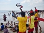 Life guards urge visitors not to venture too deep into the sea in view of 'Cyclone Montha', in Odisha's Puri Life guards urge visitors not to venture too deep into the sea in view of 'Cyclone Montha', in Odisha's Puri