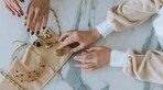 The woman put the necklace in her bag before leaving the jewellery store (Representational image) The woman put the necklace in her bag before leaving the jewellery store (Representational image)