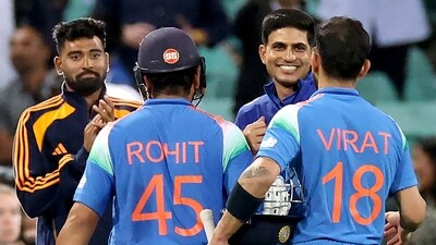 Rohit Sharma and Virat Kohli are congratulated by Shubman Gill. (AFP) Rohit Sharma and Virat Kohli are congratulated by Shubman Gill. (AFP)