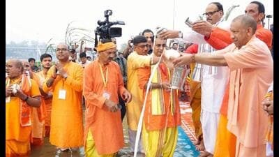 Chief minister Yogi Adityanath, along with deputy CM Brajesh Pathak and others, performs ‘arghya ‘rituals and offers prayers to the setting sun during Chhath Puja celebrations at Lakshman Mela Ground in Lucknow on Monday. (Deepak Gupta/HT Photo) Chief minister Yogi Adityanath, along with deputy CM Brajesh Pathak and others, performs ‘arghya ‘rituals and offers prayers to the setting sun during Chhath Puja celebrations at Lakshman Mela Ground in Lucknow on Monday. (Deepak Gupta/HT Photo)