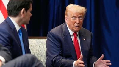 Trump's severely swollen ankles spotted at Kuala Lumpur summit, reigniting health fears (AP Photo/Mark Schiefelbein) (AP) Trump's severely swollen ankles spotted at Kuala Lumpur summit, reigniting health fears (AP Photo/Mark Schiefelbein) (AP)
