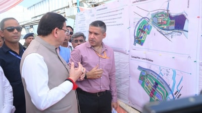 Chief Minister Pushkar Singh Dhami reviews the proposed Land Port construction site at Banbasa in Champawat district, alongside officials of the Land Ports Authority of India. Chief Minister Pushkar Singh Dhami reviews the proposed Land Port construction site at Banbasa in Champawat district, alongside officials of the Land Ports Authority of India.