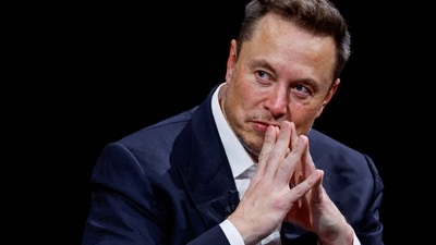 Elon Musk may step down as Tesla CEO if shareholders reject his $1 trillion compensation plan at the November 6 meeting. (REUTERS)