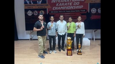 Tarun Sharma with his three students after winning four gold medals at open karate championship held in Batala on Sunday. (HT Photo) Tarun Sharma with his three students after winning four gold medals at open karate championship held in Batala on Sunday. (HT Photo)