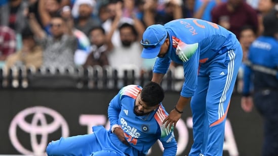 Shreyas Iyer reacts in pain after falling on the ground while taking a catch during the third one-day international. (AFP)