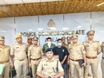 ACP Cyber Crime Aditya addressing the media after the arrest of two of the accused, in Agra, on Tuesday. (HT Photo)