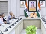 Chief minister Yogi Adityanath reviews the progress of development works under the GIS-based Ayodhya Master Plan 2031, being implemented by the Ayodhya Development Authority during a meeting, in Lucknow. (Handout via PTI Photo) Chief minister Yogi Adityanath reviews the progress of development works under the GIS-based Ayodhya Master Plan 2031, being implemented by the Ayodhya Development Authority during a meeting, in Lucknow. (Handout via PTI Photo)