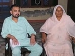 Harjinder Singh with his mother at his house in Ambala. (HT)