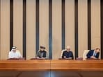 Afghan Defence Minister, Mullah Mohammad Yaqoob Mujahid and Pakistan's Defence Minister, Khawaja Muhammad Asif sign documents of a ceasefire agreement, during a negotation meeting mediated by Qatar and Turkey.