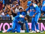 Shreyas Iyer reacts after sustaining an injury while taking the catch of Alex Carey during 3rd ODI between India and Australia