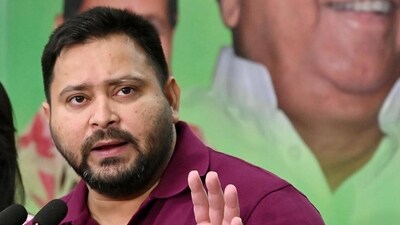 Leader of Opposition and RJD leader Tejashwi Yadav addressing a press conference at his residence in Patna. (Santosh Kumar/ HT file)
