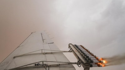 The particles are added to a cloud typically making use of an aircraft.