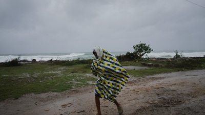 A man walks under the rain before the arrival of Hurricane Melissa in Canizo, a village in Santiago de Cuba, Monday, Oct. 28, 2025. (AP) A man walks under the rain before the arrival of Hurricane Melissa in Canizo, a village in Santiago de Cuba, Monday, Oct. 28, 2025. (AP)