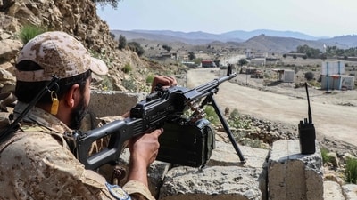A Taliban security personnel stands guard along a road near the Ghulam Khan zero-point border crossing between Afghanistan and Pakistan in Gurbuz district in the southeast of Khost province. (AFP) A Taliban security personnel stands guard along a road near the Ghulam Khan zero-point border crossing between Afghanistan and Pakistan in Gurbuz district in the southeast of Khost province. (AFP)