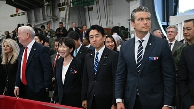 US Ambassador to Japan George Glass (2nd L), Japan's Prime Minister Sanae Takaichi (3rd L), Japan's Defense Minister Shinjiro Koizumi (2nd R), and US Defense Secretary Pete Hegseth (R) react to US President Donald Trump's speech in front of US Navy personnel on board the US Navy's USS George Washington aircraft carrier at the US naval base in Yokosuka on October 28, 2025. (Photo by ANDREW CABALLERO-REYNOLDS / AFP) (AFP) US Ambassador to Japan George Glass (2nd L), Japan's Prime Minister Sanae Takaichi (3rd L), Japan's Defense Minister Shinjiro Koizumi (2nd R), and US Defense Secretary Pete Hegseth (R) react to US President Donald Trump's speech in front of US Navy personnel on board the US Navy's USS George Washington aircraft carrier at the US naval base in Yokosuka on October 28, 2025. (Photo by ANDREW CABALLERO-REYNOLDS / AFP) (AFP)