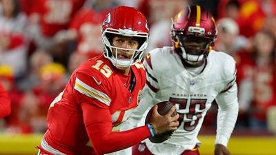Patrick Mahomes #15 of the Kansas City Chiefs scrambles against the Washington Commanders (Getty Images via AFP) Patrick Mahomes #15 of the Kansas City Chiefs scrambles against the Washington Commanders (Getty Images via AFP)