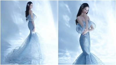 Xu Yi Yang's strapless fishtail dress is a dramatic, high-glamour look that celebrates her figure. It is the epitome of sophisticated sexiness and modern bridal couture. Xu Yi Yang's strapless fishtail dress is a dramatic, high-glamour look that celebrates her figure. It is the epitome of sophisticated sexiness and modern bridal couture.