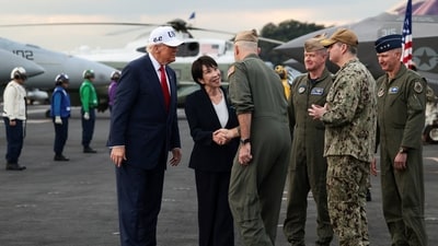 Trump and Japanese Prime Minister Sanae Takaichi are welcomed by U.S. Navy sailors, aboard the aircraft carrier USS George Washington, during a visit to U.S. Navy's Yokosuka base in Yokosuka, Japan, October 28, 2025. REUTERS/Evelyn Hockstein (REUTERS)