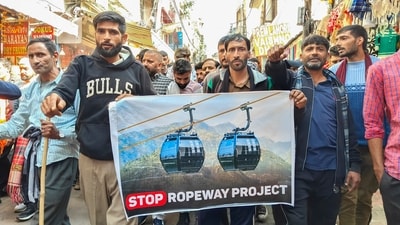 People take part in a protest march during the fourth day of a strike against a proposed ropeway project along the trek route to the Vaishno Devi shrine, at Katra in Reasi district, Jammu & Kashmir. (PTI) People take part in a protest march during the fourth day of a strike against a proposed ropeway project along the trek route to the Vaishno Devi shrine, at Katra in Reasi district, Jammu & Kashmir. (PTI)