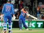 India's Abhishek Sharma (R) hits a shot