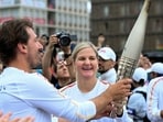 Kirsty Coventry C) at the Paris 2024 Olympic Torch Relay, Paris. (IOC) Kirsty Coventry C) at the Paris 2024 Olympic Torch Relay, Paris. (IOC)