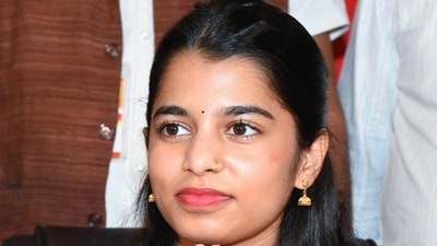 Playback singer Maithili Thakur greets as she joins the BJP during Milan Samaroh, in Patna on Tuesday. (ANI Photo) (Rahul Sharma) Playback singer Maithili Thakur greets as she joins the BJP during Milan Samaroh, in Patna on Tuesday. (ANI Photo) (Rahul Sharma)