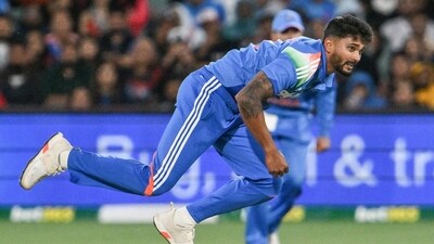 India's Nitish Kumar Reddy bowls during the second one-day international (ODI) men's cricket match between Australia and India at the Adelaide Oval (AFP) India's Nitish Kumar Reddy bowls during the second one-day international (ODI) men's cricket match between Australia and India at the Adelaide Oval (AFP)