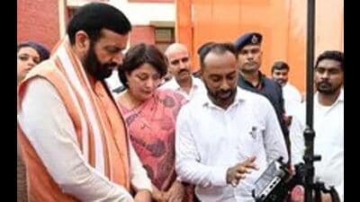 Chief minister Nayab Singh Saini inaugurating four schemes of the revenue department -- paperless registry, demarcation portal, WhatsApp chatbot and revenue court management system from Babain sub-tehsil of Kurukshetra on September 29. (HT file photo)