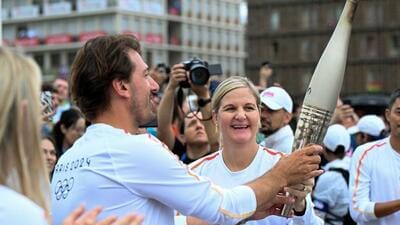 Kirsty Coventry C) at the Paris 2024 Olympic Torch Relay, Paris. (IOC) Kirsty Coventry C) at the Paris 2024 Olympic Torch Relay, Paris. (IOC)
