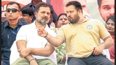 LoP in the Lok Sabha and Congress leader Rahul Gandhi with RJD leader Tejashwi Yadav during a rally ahead of the Bihar Assembly elections, in Muzaffarpur on Wednesday. (PTI) LoP in the Lok Sabha and Congress leader Rahul Gandhi with RJD leader Tejashwi Yadav during a rally ahead of the Bihar Assembly elections, in Muzaffarpur on Wednesday. (PTI)