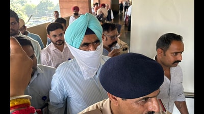 Punjab DIG Harcharan Singh Bhullar in Sector 43 district court in Chandigarh. (HT File) Punjab DIG Harcharan Singh Bhullar in Sector 43 district court in Chandigarh. (HT File)