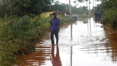 A man walks on a flooded road, after Hurricane Melissa made landfall, in Prospect, Manchester, Jamaica, October 29, 2025. REUTERS/Octavio Jones (REUTERS)