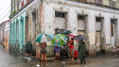 Residents wait in the streets for food hours before Hurricane Melissa hits the city of Santiago de Cuba, Cuba, on October 28, 2025. (AFP) Residents wait in the streets for food hours before Hurricane Melissa hits the city of Santiago de Cuba, Cuba, on October 28, 2025. (AFP)