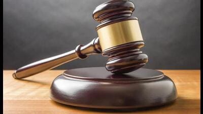 The local commissioner stated that two individuals — Nitin Bansal and Sonu Gupta — were present at the site, and that Nitin allegedly became aggressive, pulled out a pistol and placed it on his office table, thereby obstructing the inspection. (Representational image) The local commissioner stated that two individuals — Nitin Bansal and Sonu Gupta — were present at the site, and that Nitin allegedly became aggressive, pulled out a pistol and placed it on his office table, thereby obstructing the inspection. (Representational image)